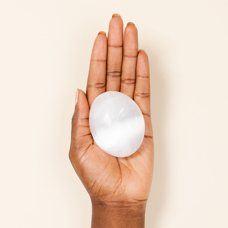 selenite palm stone